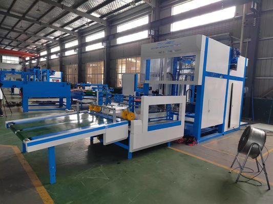 Appareil d'empilage automatique pour la production de carton ondulé